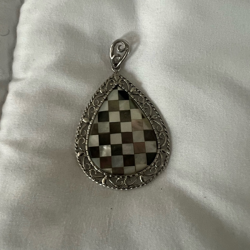 Elegant Silver and Black Teardrop Pendant